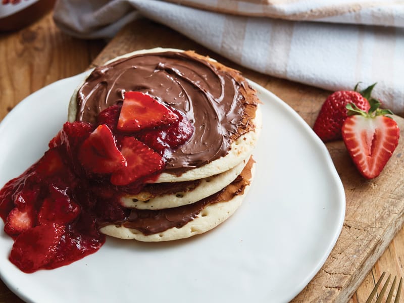 Hello there ricotta and NUTELLA pancakes with warm strawberry sauce